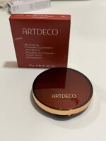 Bronzig powder compact artdeco